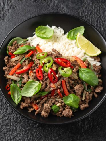 Overhead image of Pad Kra Pao in a black bowl