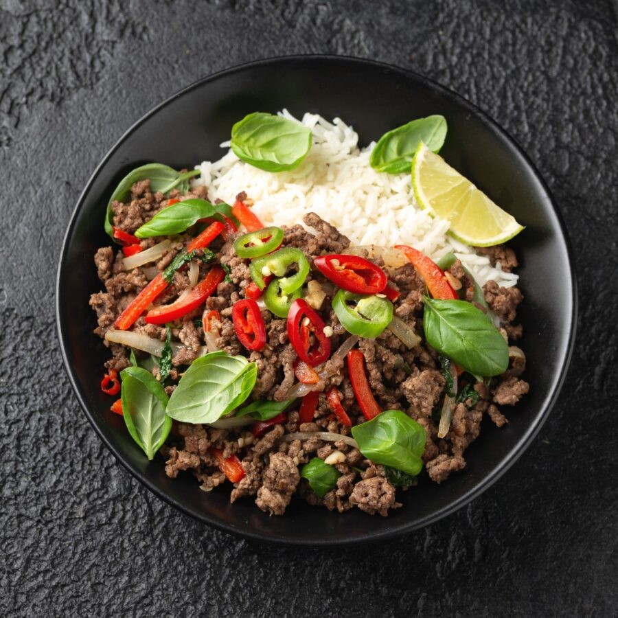 Overhead image of Pad Kra Pao in a black bowl