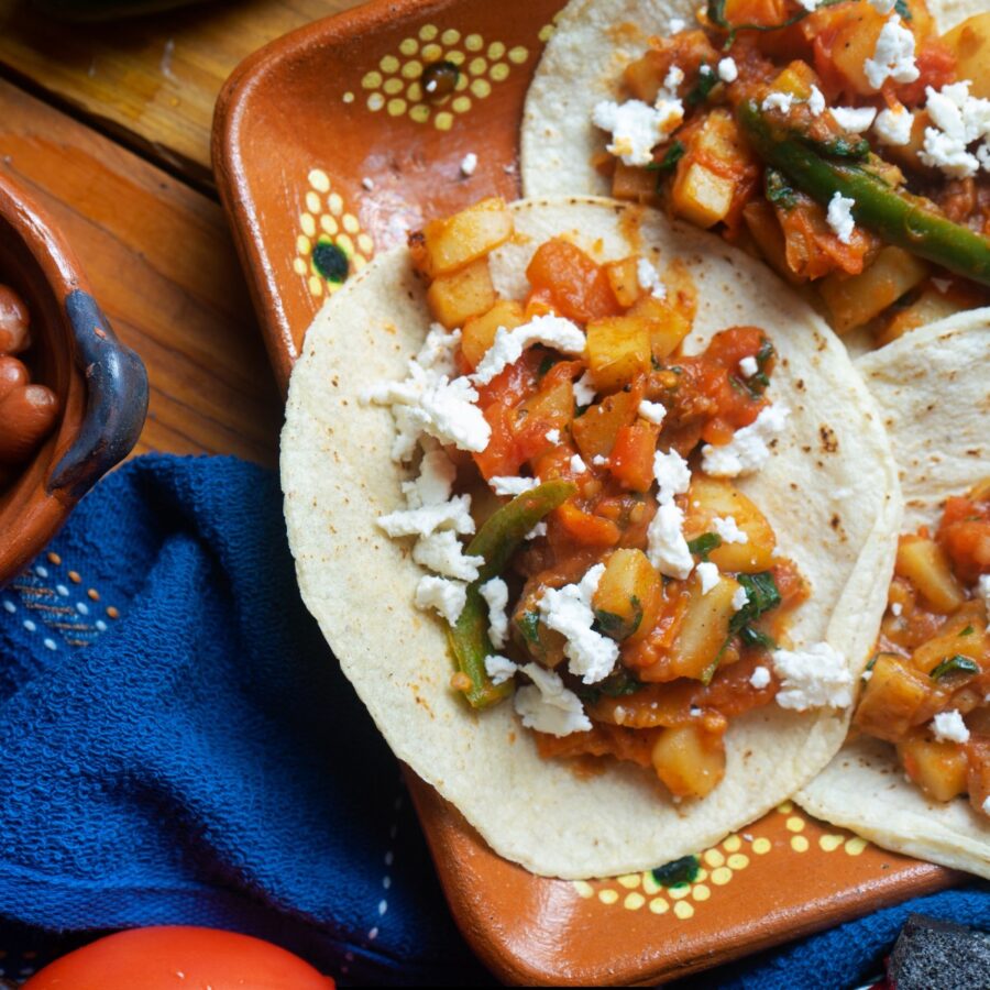 Three Potato Tacos on a decroative plate