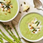 Overhead image of two bowls of asparagus soup - 8