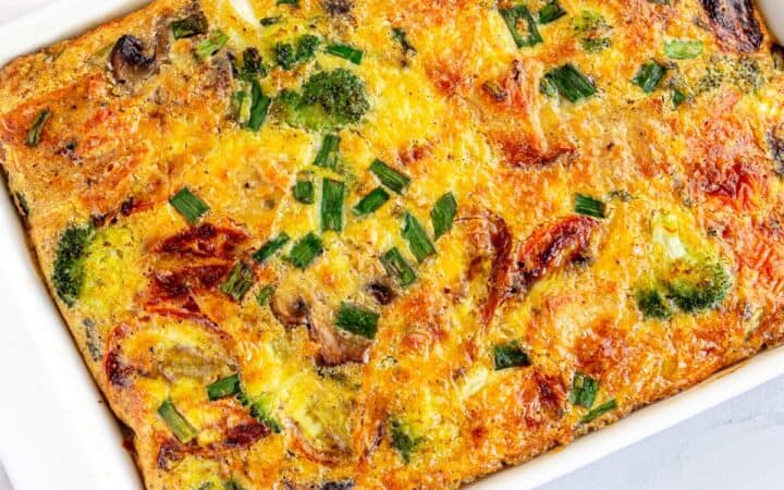 Overhead image of the best breakfast casserole in a white baking dish