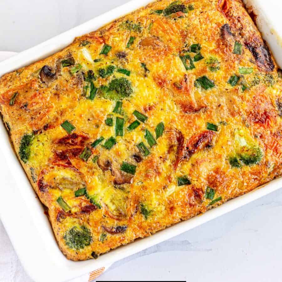 Overhead image of the best breakfast casserole in a white baking dish