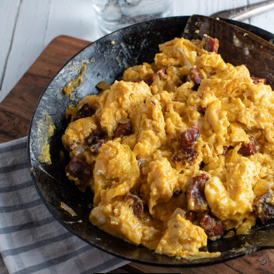 Overhead image of Chorizo and Eggs in a black dish