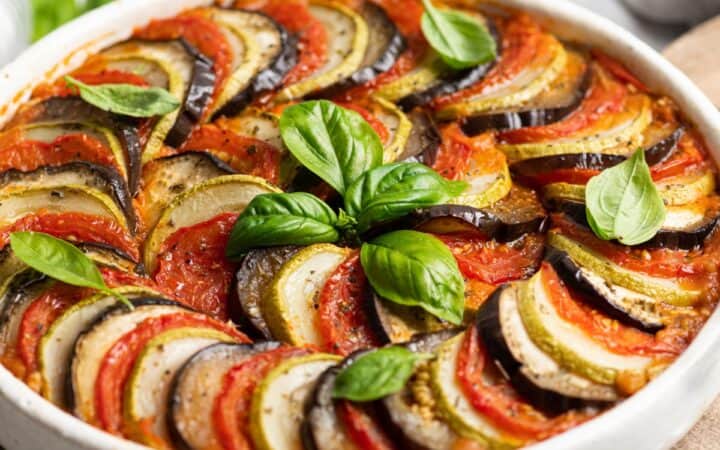 Close up image of Layered Ratatouille in a white dish