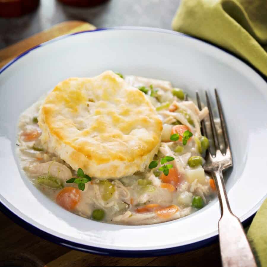 Overhead image of Slow Cooker Chicken Pot Pie with a biscuit on top