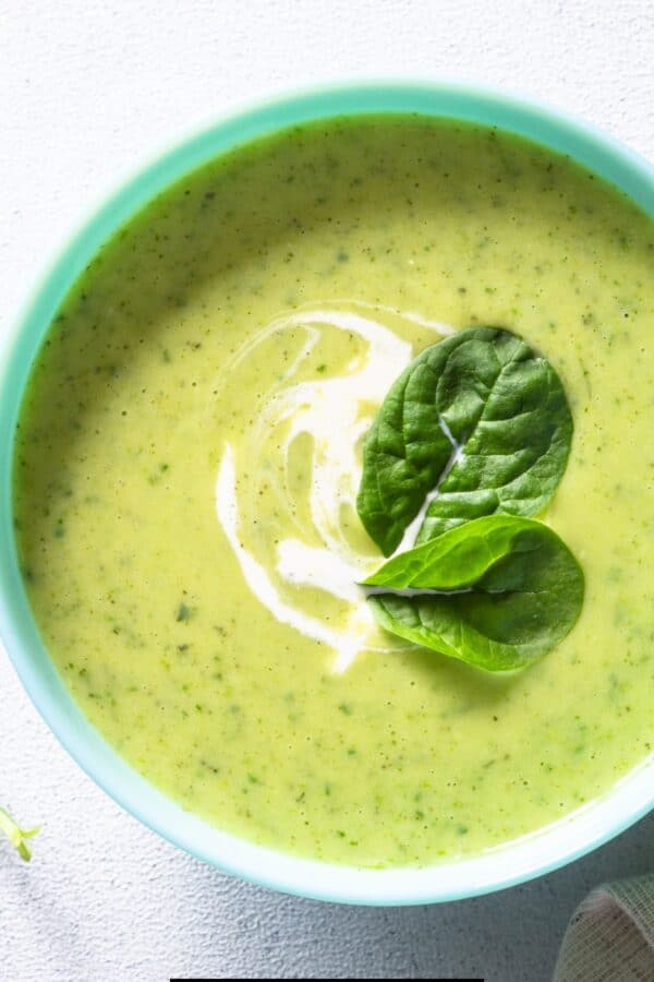 Overhead image of Spinach Soup in a blue bowl