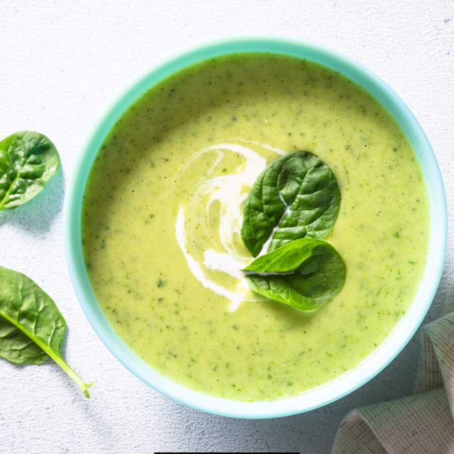 Overhead image of Spinach Soup in a blue bowl