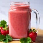 Strawberry Smoothie in a glass mug with strawberries to garnish - 8