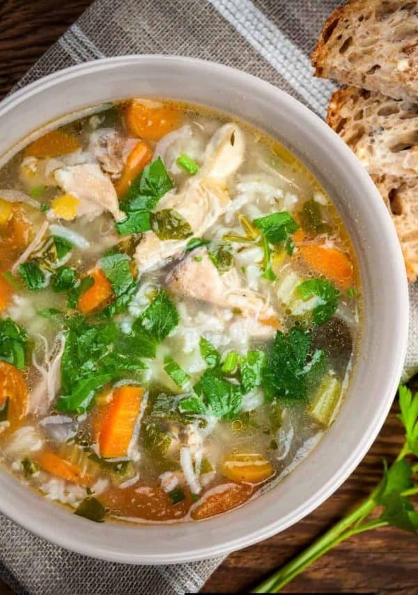 Overhead image of Feel Better Chicken Soup with a side of bread