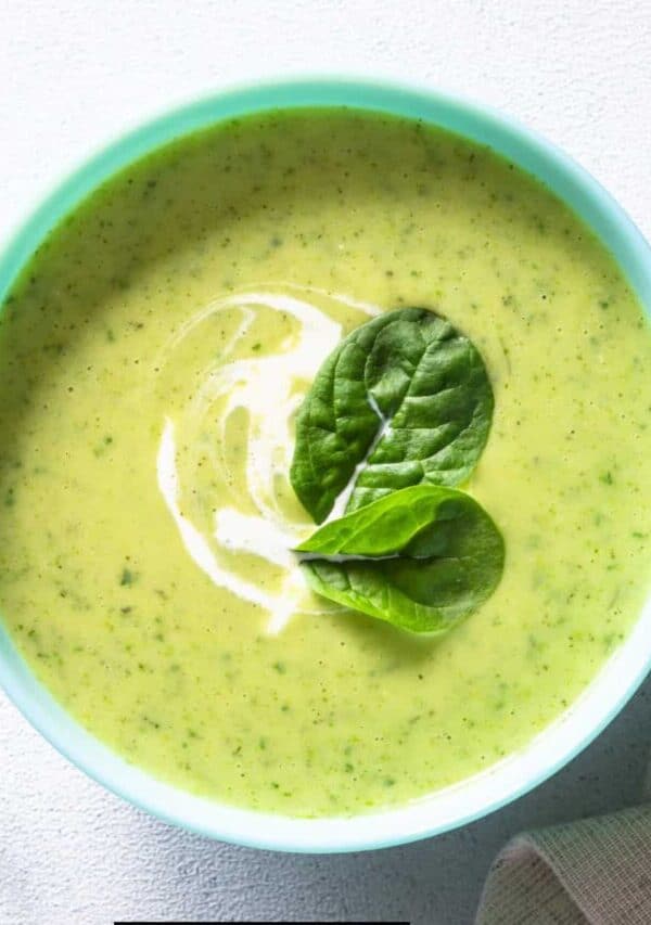 Overhead image of Spinach Soup in a blue bowl