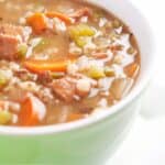Instant Pot Beef and Barley Soup in a green bowl - 9