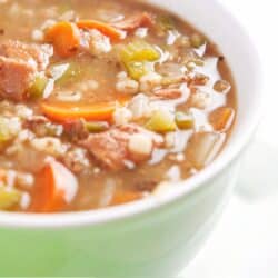 Instant Pot Beef and Barley Soup in a green bowl