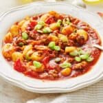 Gnocchi Bolognese in a decorative white bowl - 8