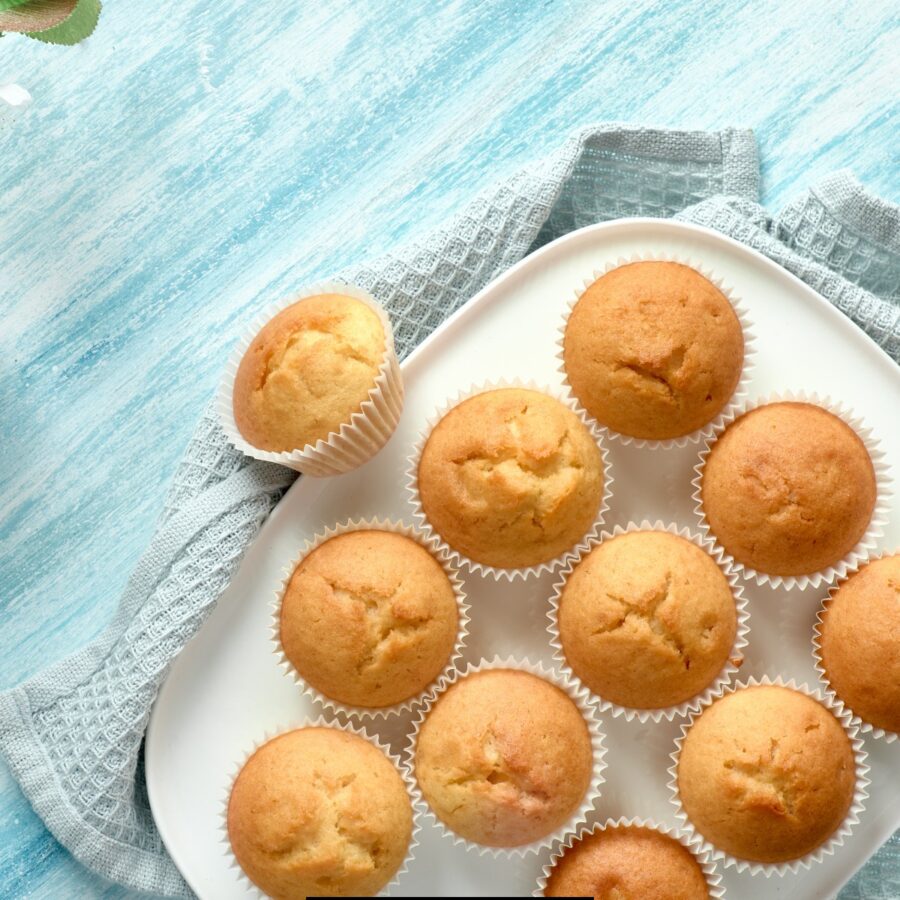 Overhead image of Lemon Muffins on a white serving tray