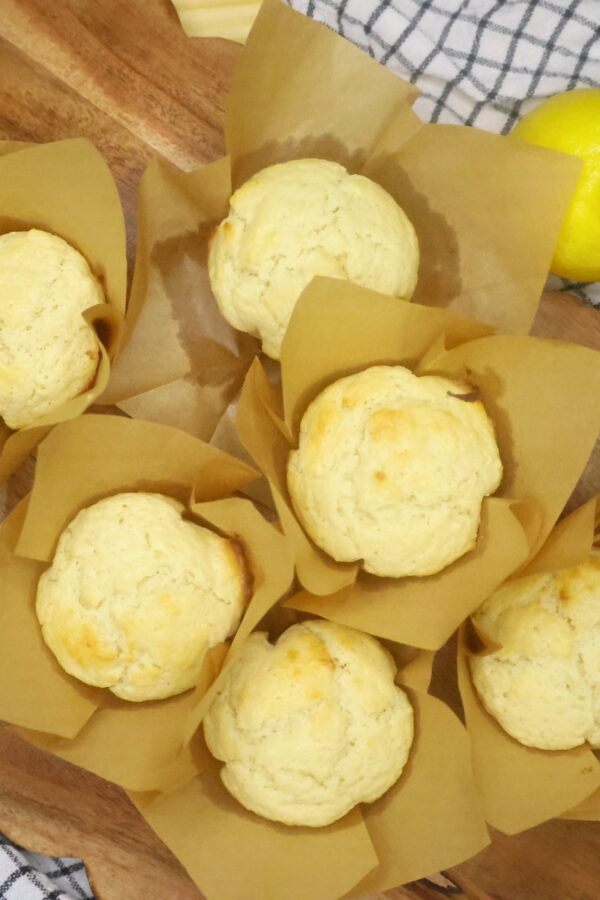 Overhead image of lemon muffins on a serving board