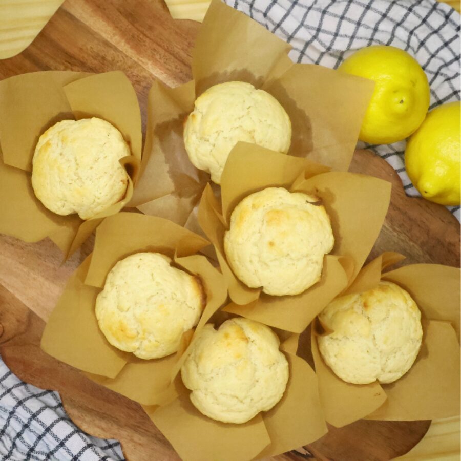 Overhead image of lemon muffins on a serving board