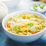 Close up image of Rotisserie Chicken Soup in a white bowl - 8