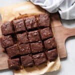 Overhead image of Cottage Cheese Brownies on a wooden cutting board - 8