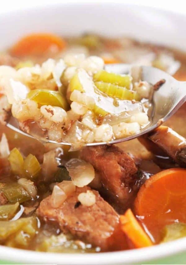 Close up image of Instant Pot Beef and Barley Soup in a bowl