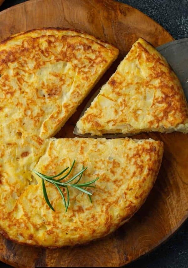 Overhead image of a Potato Frittata with a slice cut out of it