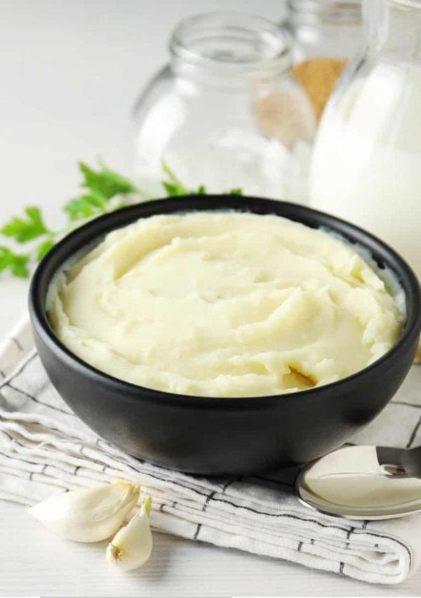 Overhead image of Sour Cream Mashed Potatoes on a light background