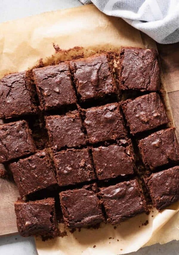 Overhead image of Cottage Cheese Brownies on a wooden cutting board