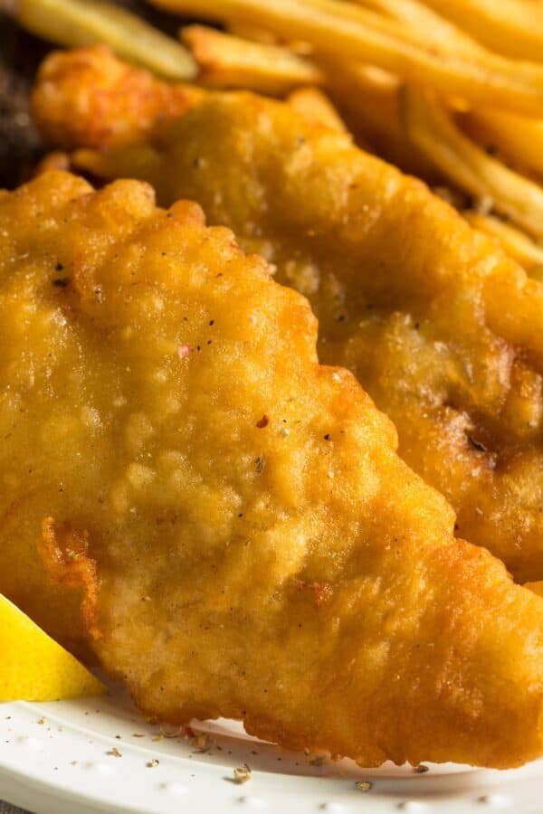 Close up image of Beer Battered Fish on a white plate