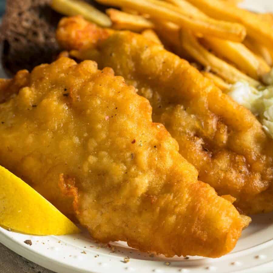 Close up image of Beer Battered Fish on a white plate