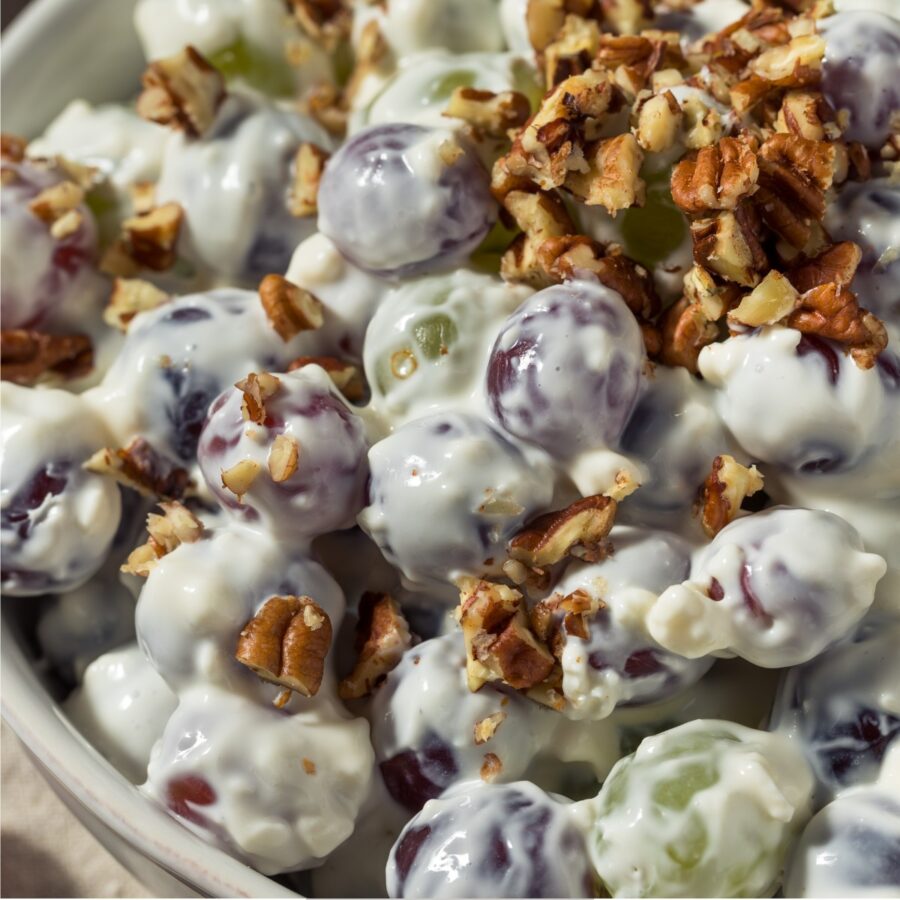 Close up image of Grape salad with a chopped nut garnish
