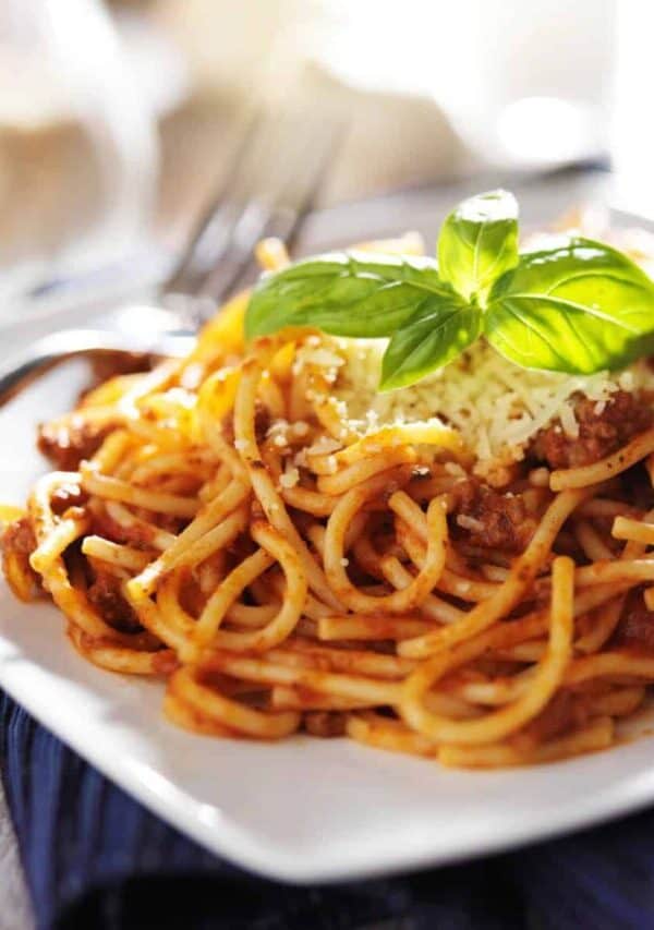 Sausage Spaghetti on a square white plate