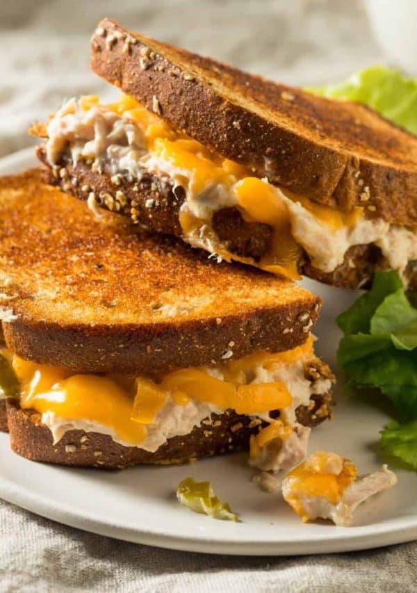 A Tuna Melt stacked on top of another Tuna Melt on a plate