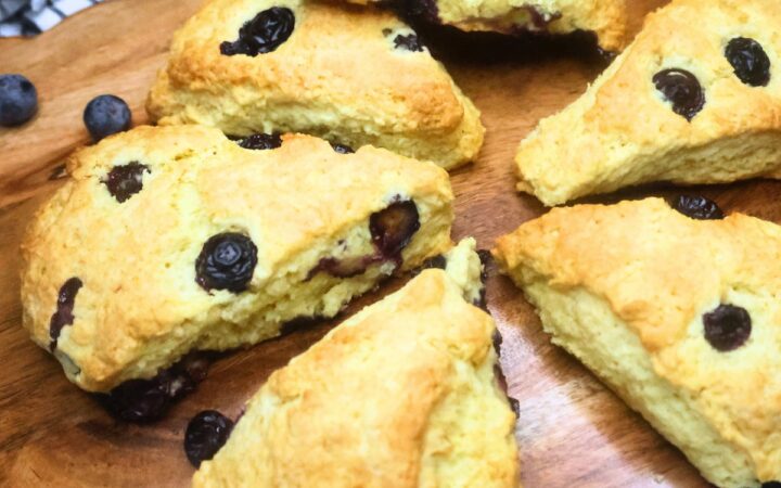 Blueberry scones on a wooden serving board