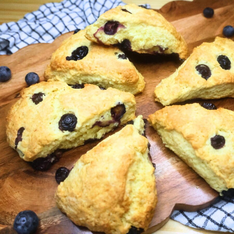 Blueberry scones on a wooden serving board