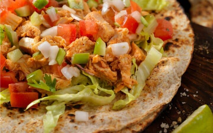 Close up image of Buffalo Chicken Tacos on a rustic table