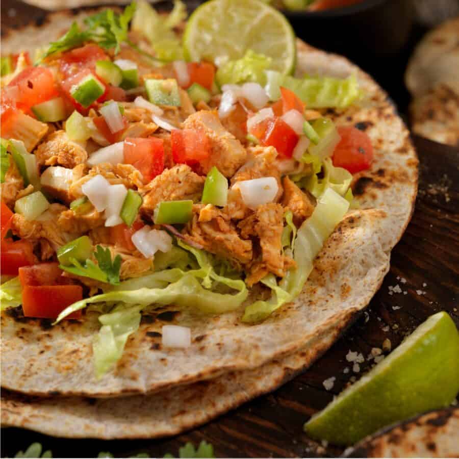 Close up image of Buffalo Chicken Tacos on a rustic table