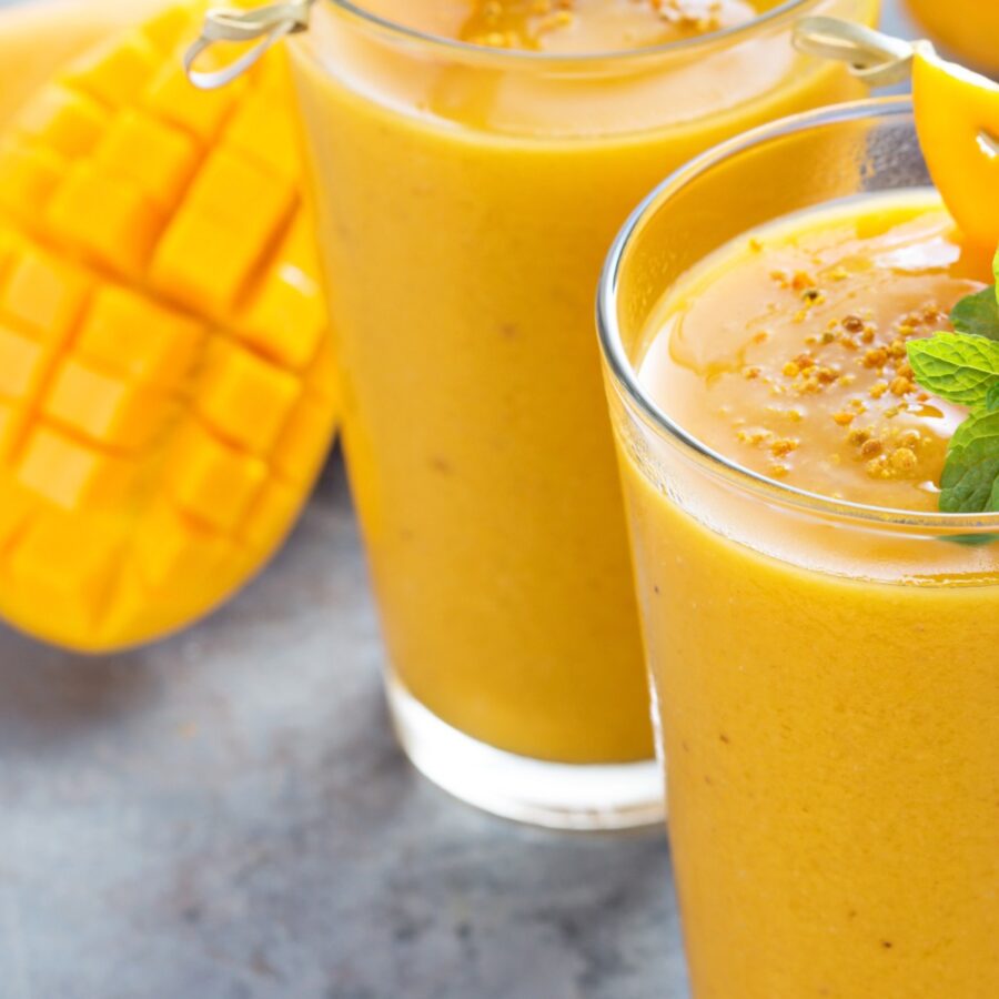 Close up image of two glasses of Mango Smoothie