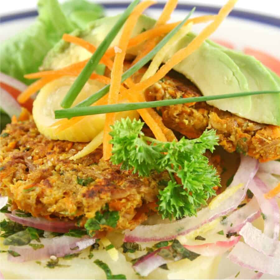 Tuna Patties on a simple salad with avocado