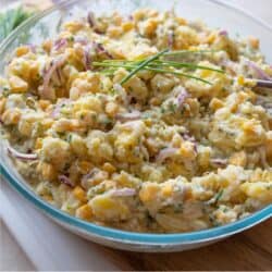 Close up image of Vegan Potato Salad in a glass bowl