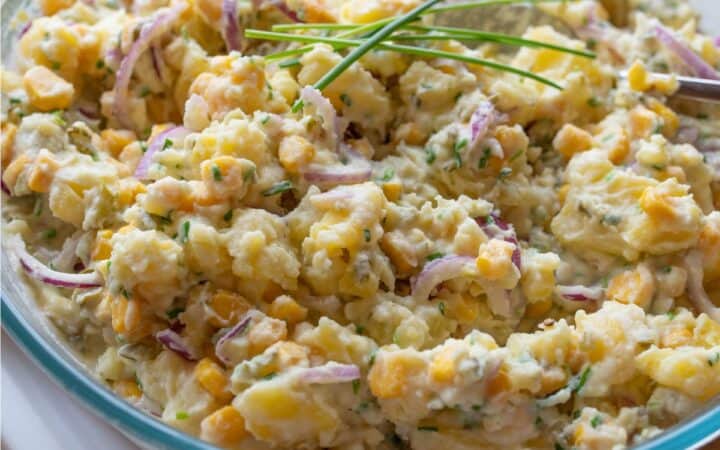 Close up image of Vegan Potato Salad in a glass bowl
