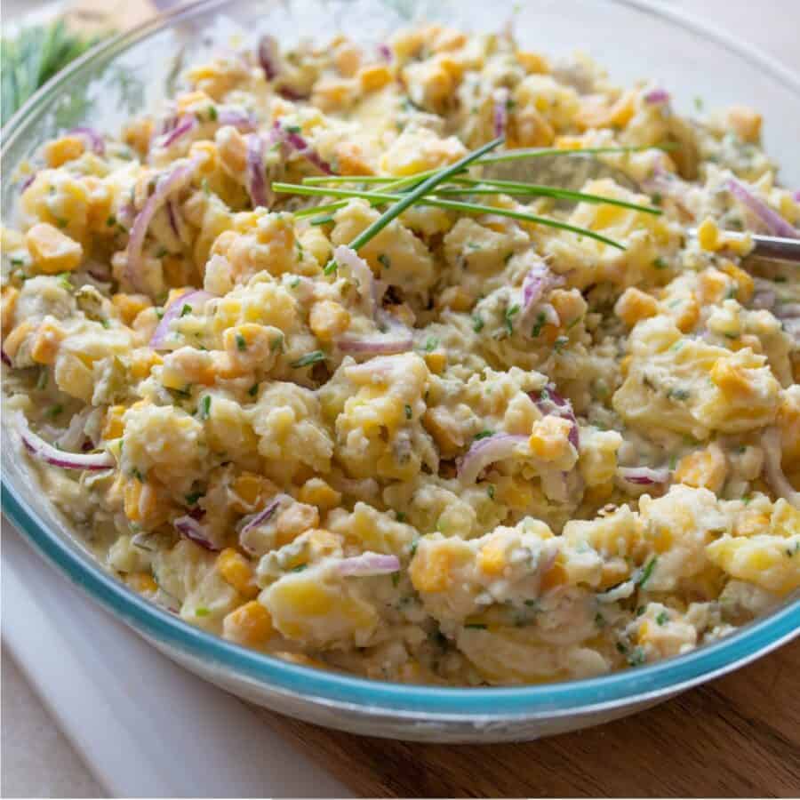 Close up image of Vegan Potato Salad in a glass bowl