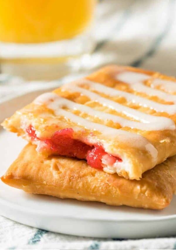 A white plate with Toaster Strudel stacked on top