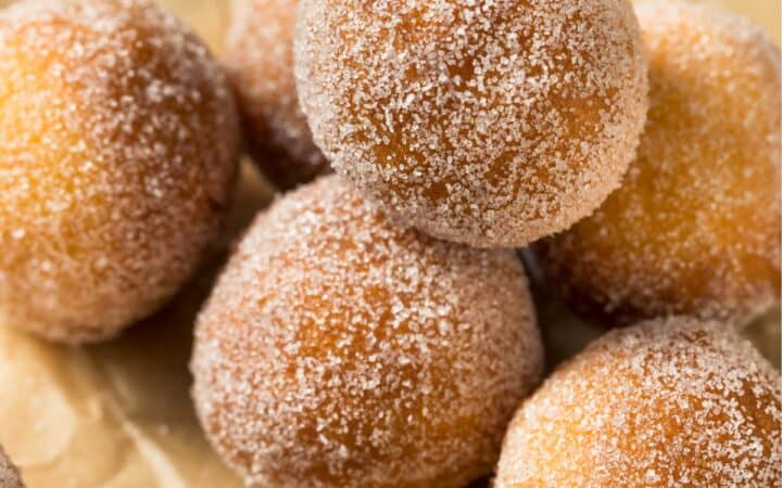 Close up image of Air Fryer Donut Holes on a neutral background