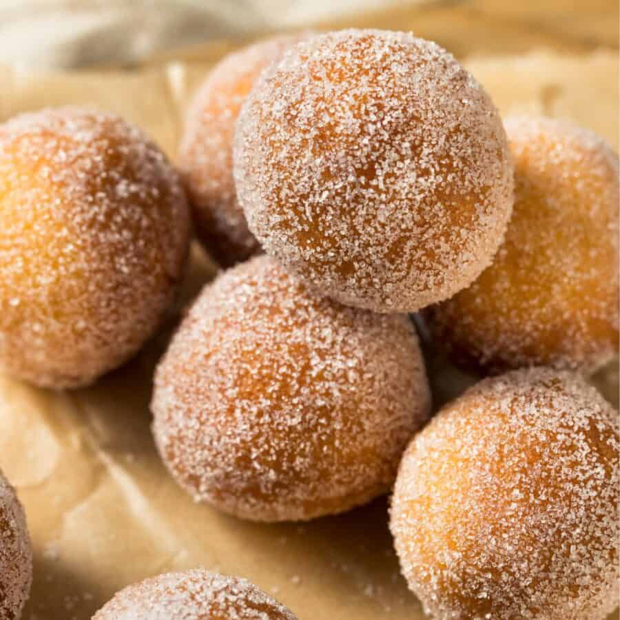 Close up image of Air Fryer Donut Holes on a neutral background