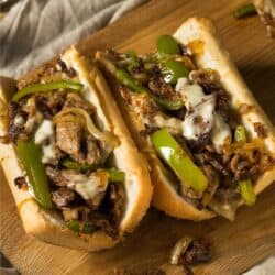 Close up image of two Philly Cheesesteaks