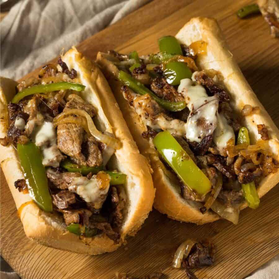 Close up image of two Philly Cheesesteaks