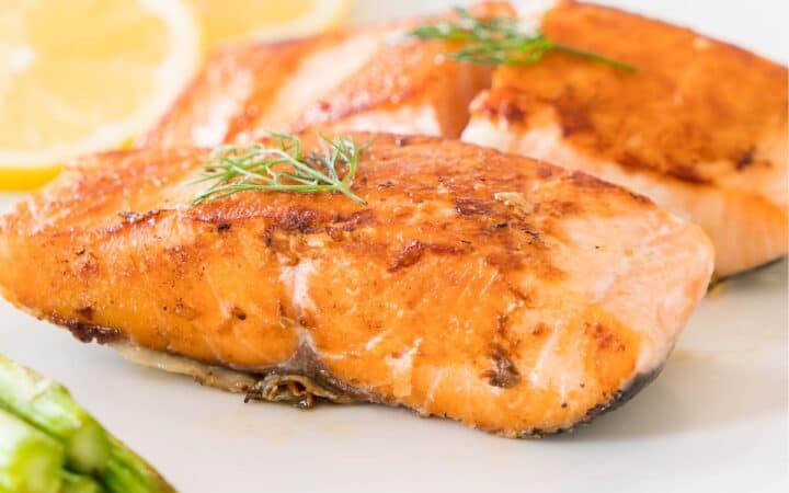 Close up image of Honey Lemon Salmon on a white plate