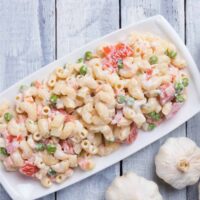 Overhead image of Macaroni Salad on a white platter
