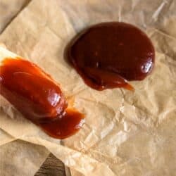 Steak Sauce on a brush and poured on to parchment paper