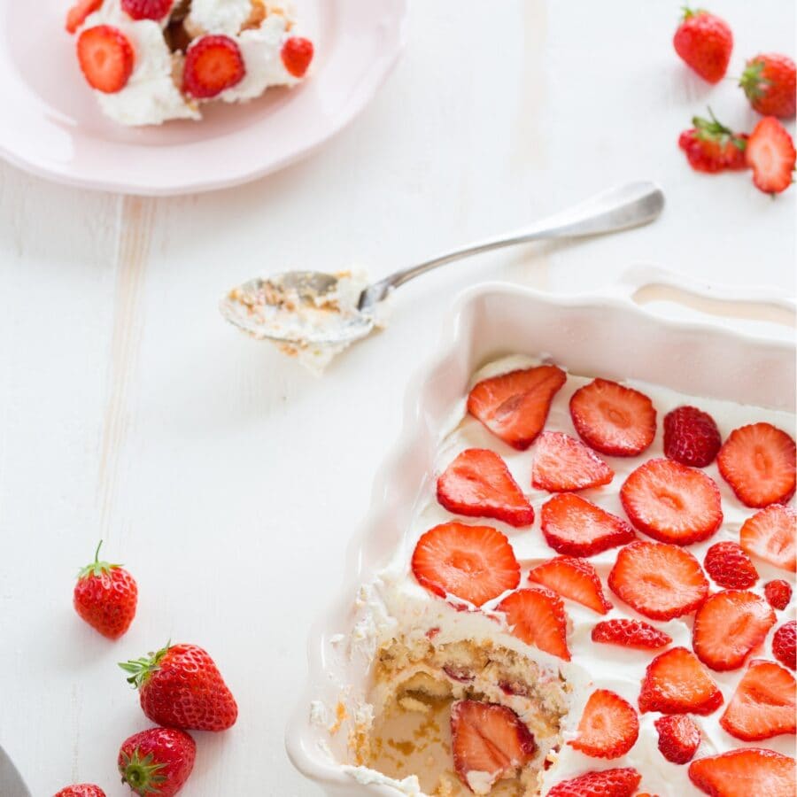 Overhead image of Strawberry Tiramisu with a portion served on a plate by it