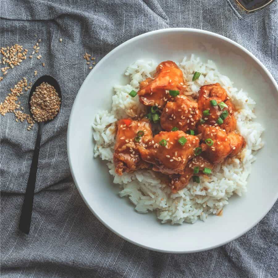 Overhead image of Sweet Chili Chicken on awhite plate with rice
